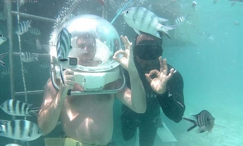 Undersea-walk helmet experience among fish in Belle Mare Lagoon
