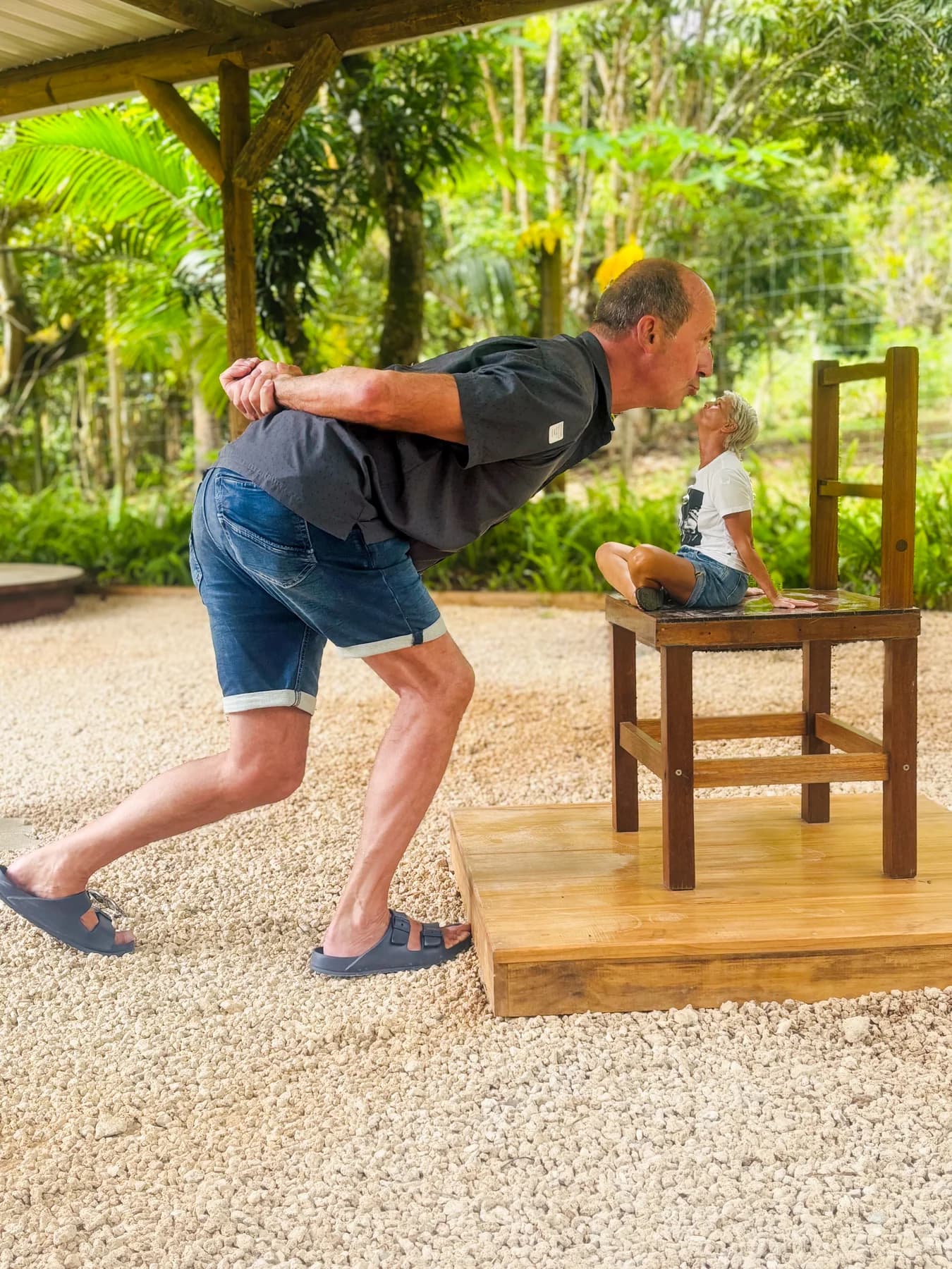 A playful perspective photograph at the giant chair in Curious Mauritius