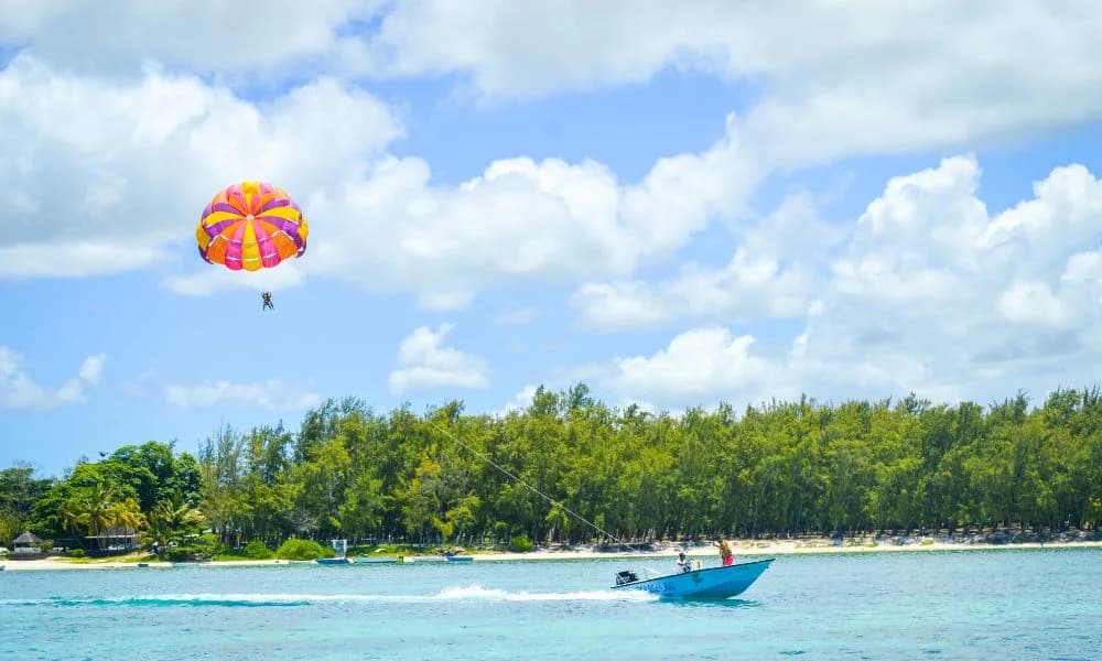 Aquacity parasailing flight above the lagoon and beach at Belle Mare