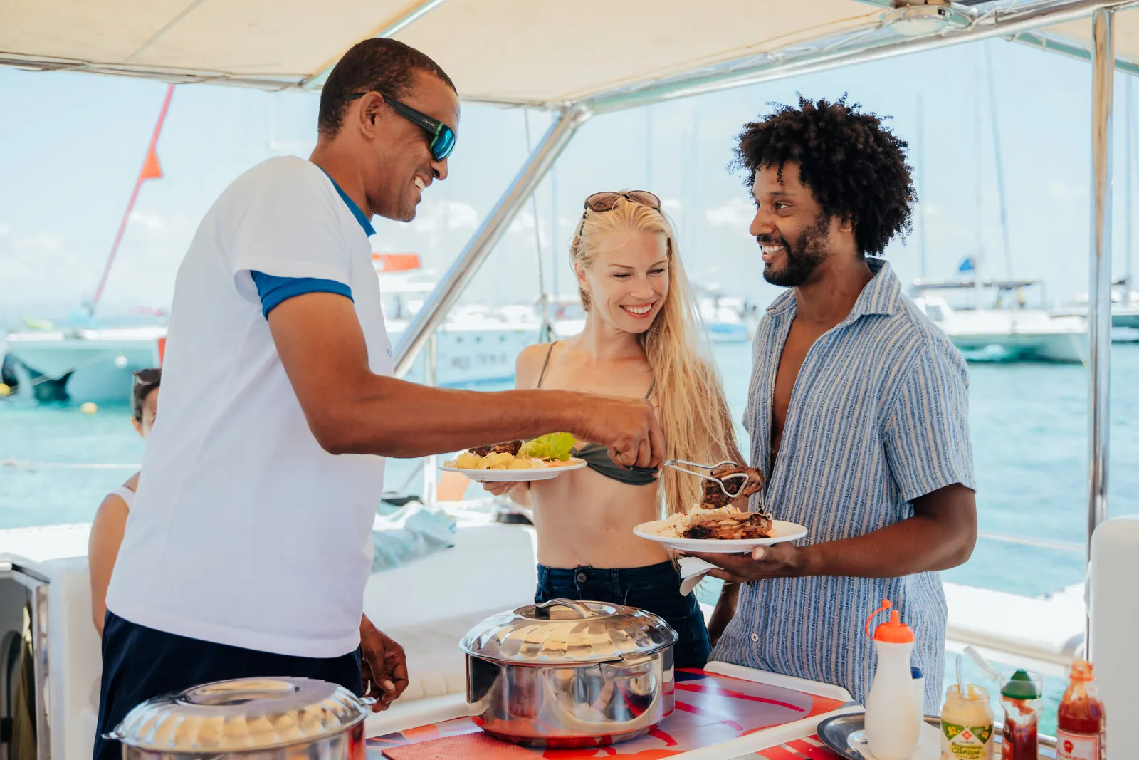Lunch being served to guests aboard Le Pacha